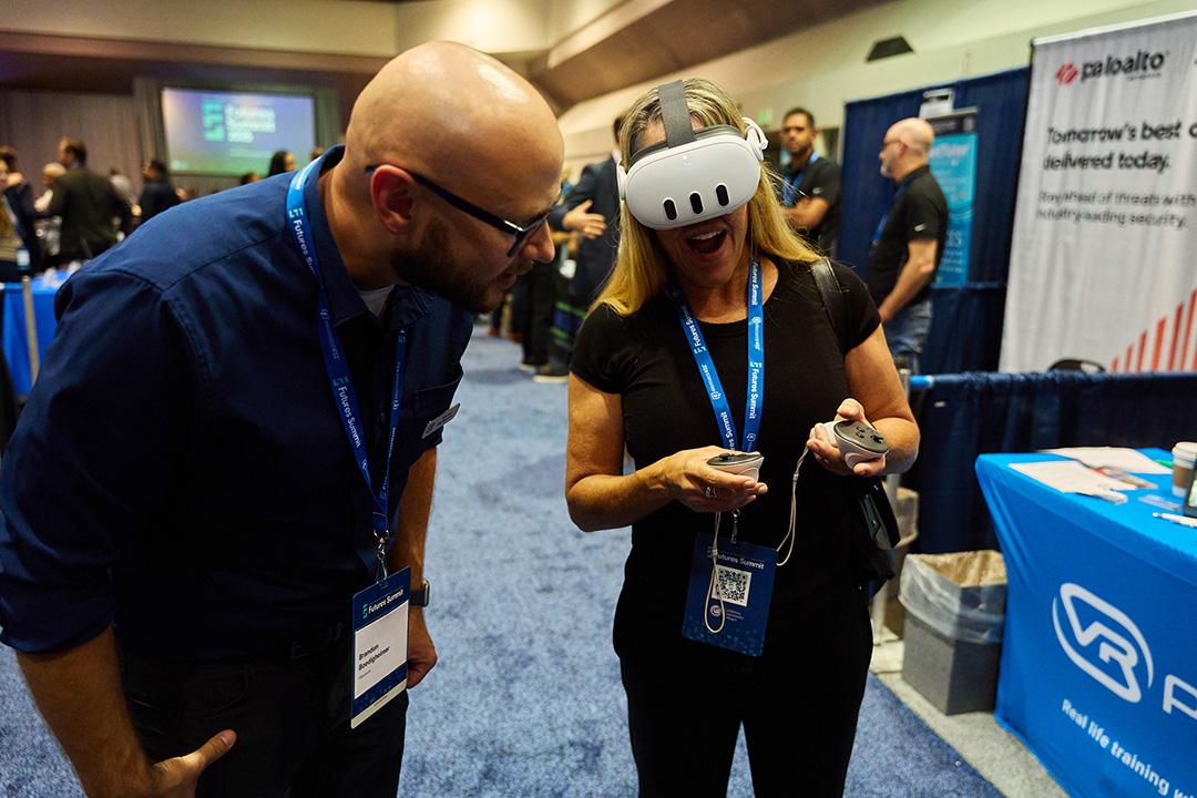 Female attendee wearing a virtual headset.
